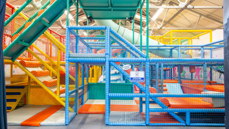 Three storeys of soft play frame and slides